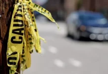 Vigilante muere en asalto a farmacia en Santo Domingo Este
