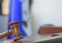 Tribunal condena mujer a la que se le imputó vender municiones de la policía dominicana a haitianos