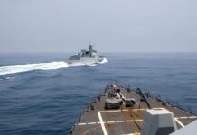 China envía fuerzas para vigilar un buque de guerra de EEUU